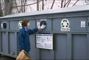girl at recycling bin.jpg 